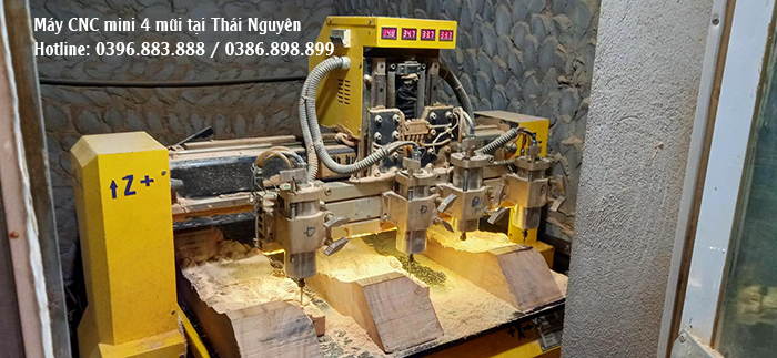 máy cnc đục gỗ 4 mũi